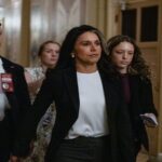 Tulsi Gabbard and others walking behind her