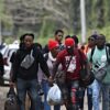 Biden Judge Rewrites Immigration Law to Keep Haitians in America